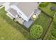 Overhead view of a backyard with a deck, patio, privacy fence, and a large, well-maintained lawn at 13817 Black Canyon Ct, Fishers, IN 46038