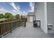 Inviting back deck with a gray stain, offering a relaxed outdoor living space at 13817 Black Canyon Ct, Fishers, IN 46038