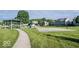 Community basketball court with a gazebo and picnic tables for residents at 13817 Black Canyon Ct, Fishers, IN 46038