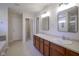 Bathroom with double sinks, and a tiled shower at 13817 Black Canyon Ct, Fishers, IN 46038