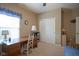 Cozy bedroom featuring a wooden desk, closet, and neutral decor for a relaxing atmosphere at 13817 Black Canyon Ct, Fishers, IN 46038