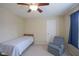 Bedroom featuring carpeted floors and a ceiling fan, providing a comfortable space for rest and relaxation at 13817 Black Canyon Ct, Fishers, IN 46038