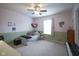 Cozy bedroom with carpeted floors and a ceiling fan, a comfortable retreat for relaxation and rest at 13817 Black Canyon Ct, Fishers, IN 46038