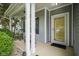 Inviting front porch with classic rocking chairs and decorative details on the front of the house at 13817 Black Canyon Ct, Fishers, IN 46038