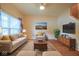 Bright and inviting living room with comfortable seating, stylish decor, and ample natural light at 13817 Black Canyon Ct, Fishers, IN 46038