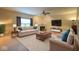 Spacious living room with fireplace, large windows and plush seating perfect for entertaining at 13817 Black Canyon Ct, Fishers, IN 46038