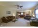Inviting living room featuring open layout with views of the kitchen and dining area, perfect for gatherings at 13817 Black Canyon Ct, Fishers, IN 46038