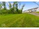 Expansive backyard with lush green space for activities and play at 14350 Ludwell Ct, Fishers, IN 46037