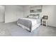 Serene bedroom with a comfortable bed, stylish rug, and neutral decor at 14350 Ludwell Ct, Fishers, IN 46037