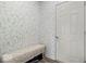 Charming entryway featuring floral wallpaper with a cozy bench and natural light at 14350 Ludwell Ct, Fishers, IN 46037