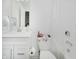 Clean bathroom featuring a white vanity with sink, toilet, and tiled shower at 1510 Stonehaven Dr, Westfield, IN 46074