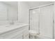 Bright bathroom with a sleek vanity, quartz countertop, and glass-enclosed shower at 1510 Stonehaven Dr, Westfield, IN 46074
