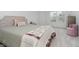 Cozy bedroom featuring neutral carpet, soft lighting, and a window with neighborhood views at 1510 Stonehaven Dr, Westfield, IN 46074