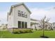 Two-story home showcasing manicured lawn, brick accents, and professionally landscaped yard at 1510 Stonehaven Dr, Westfield, IN 46074