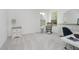 Bright office with natural light, neutral tones, and a rocking chair at 1510 Stonehaven Dr, Westfield, IN 46074