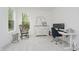 Home office with natural light, rocking chair, and a view of the outdoors at 1510 Stonehaven Dr, Westfield, IN 46074