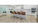 Bright modern kitchen featuring a center island with seating, stainless steel appliances, and ample cabinet space at 1510 Stonehaven Dr, Westfield, IN 46074