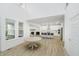 Spacious living space with open floor plan, kitchen, and modern fireplace at 1510 Stonehaven Dr, Westfield, IN 46074