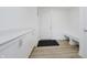 Mudroom with built-in cabinets, bench, and convenient access to the home's entrance at 1510 Stonehaven Dr, Westfield, IN 46074