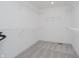 Walk-in closet with wire shelving and neutral carpet, creating a blank canvas for organization at 1510 Stonehaven Dr, Westfield, IN 46074