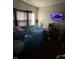 Bedroom featuring a bed, window with blinds, and a ceiling light at , Indianapolis, IN 46202