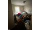 Bedroom featuring a bed, window with blinds, and a ceiling light at , Indianapolis, IN 46202