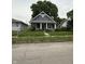 Charming single-Gathering home featuring a quaint porch and a well-maintained front yard at , Indianapolis, IN 46202