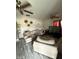 A spacious living room featuring tile floors, ceiling fans, and a cozy seating area at , Indianapolis, IN 46202