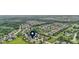 Aerial view showcases a Gathering-friendly neighborhood with green spaces and tree-lined streets at 15292 Slateford Rd, Noblesville, IN 46062