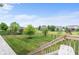 View of the well-maintained backyard and wrought iron perimeter fence from the deck at 15292 Slateford Rd, Noblesville, IN 46062