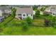 An aerial view of a spacious backyard with a well-maintained lawn and perimeter fence at 15292 Slateford Rd, Noblesville, IN 46062