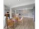 Finished basement with modern floors, bar area, and entertainment space at 15292 Slateford Rd, Noblesville, IN 46062