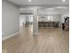 Finished basement with a bar area, game area, and modern vinyl floors at 15292 Slateford Rd, Noblesville, IN 46062