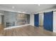 Finished basement featuring a modern fireplace, accent wall, and modern floors at 15292 Slateford Rd, Noblesville, IN 46062