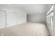 Bright bedroom with neutral carpet, great natural light and ample closet space at 15292 Slateford Rd, Noblesville, IN 46062