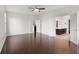 Spacious main bedroom featuring hardwood floors, a ceiling fan, and access to the ensuite bathroom at 15292 Slateford Rd, Noblesville, IN 46062