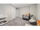 Bedroom featuring plush carpeting, neutral walls, and ample natural light from the windows at 15418 Tattersalls Ln, Fishers, IN 46040