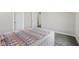 Comfortable bedroom with neutral carpet and a view into the hallway at 15418 Tattersalls Ln, Fishers, IN 46040