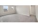 Bright and airy bedroom with plush carpeting and multiple windows for natural light at 15418 Tattersalls Ln, Fishers, IN 46040