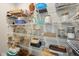 Walk-in pantry with plenty of storage space, including wire shelves full of jars and containers at 15418 Tattersalls Ln, Fishers, IN 46040