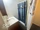 Simple bathroom with shower curtain and sink at 162 N Gladstone Ave, Columbus, IN 47201