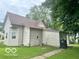 View of a single-Gathering home featuring light siding and a brown roof at 162 N Gladstone Ave, Columbus, IN 47201