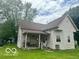 Charming single-Gathering home featuring a welcoming front porch, well-maintained lawn, and classic architectural details at 162 N Gladstone Ave, Columbus, IN 47201