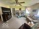 Spacious living room providing a comfortable area for relaxation and entertainment with carpet floors at 162 N Gladstone Ave, Columbus, IN 47201