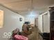 Cozy living room with chair, desk, and door, perfect for relaxing at 162 N Gladstone Ave, Columbus, IN 47201