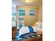 Charming bedroom with nautical decor and wood floors at 179 E Pearl St, Greenwood, IN 46143