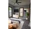 Inviting bedroom with modern furnishings, stylish decor, and a ceiling fan for added comfort at 179 E Pearl St, Greenwood, IN 46143
