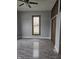 Cozy bedroom showcasing modern flooring, built in storage, and a window at 179 E Pearl St, Greenwood, IN 46143