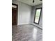 Bright bedroom showcasing updated flooring, paint and modern trim at 179 E Pearl St, Greenwood, IN 46143