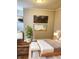 Comfortable bedroom featuring wood floors, modern decor, and ample natural light at 179 E Pearl St, Greenwood, IN 46143
